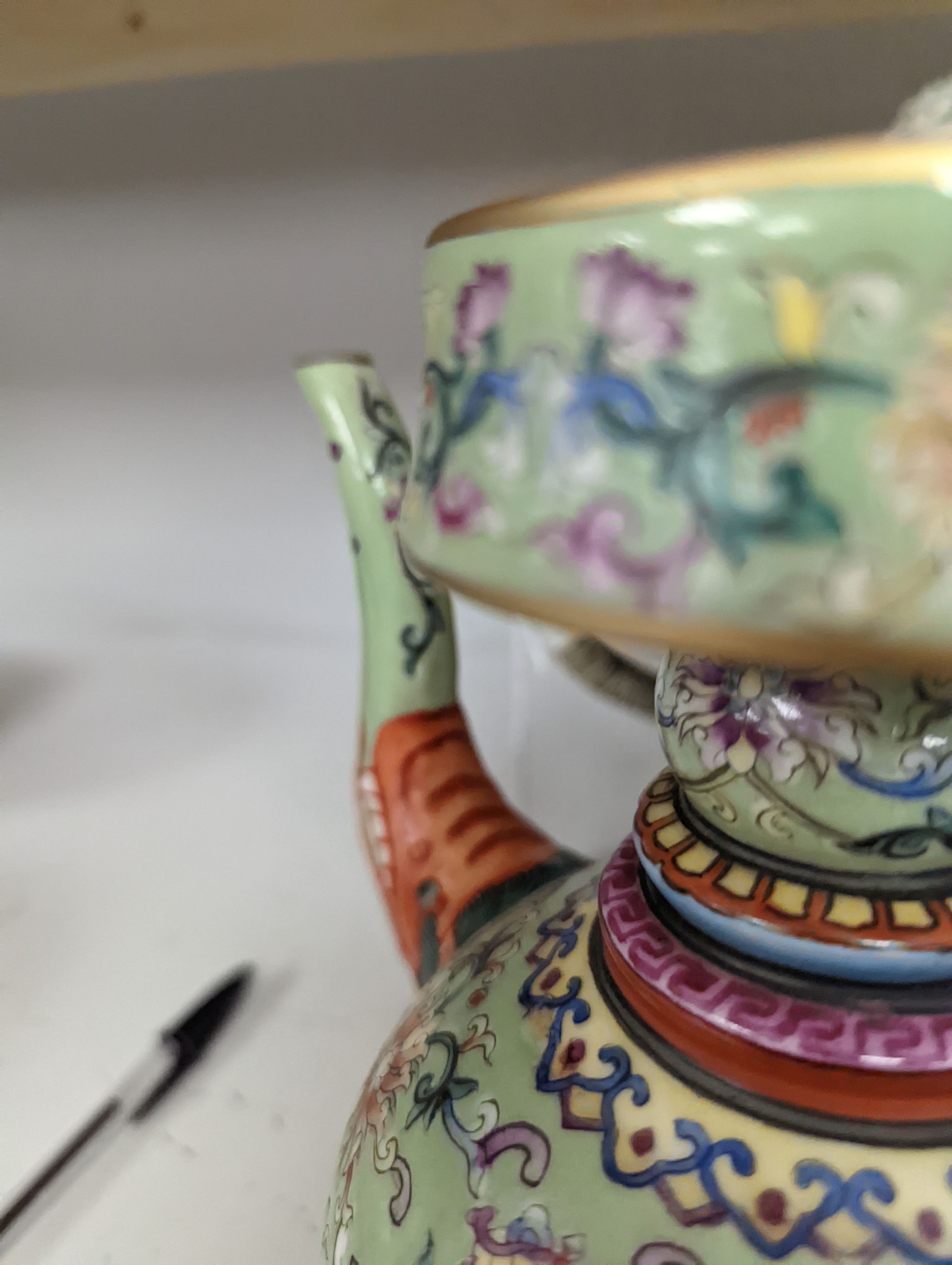 A large 19th century Chinese famille rose wine pot, and another wine pot, tallest 27cm